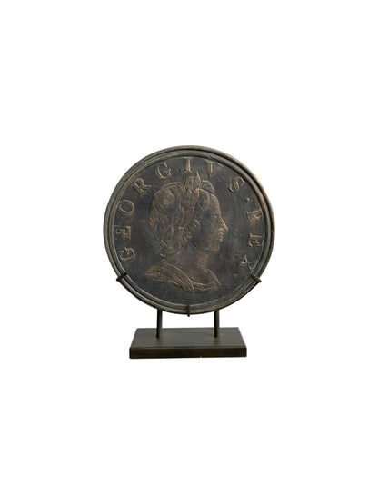 Antique Old Coin on Stand